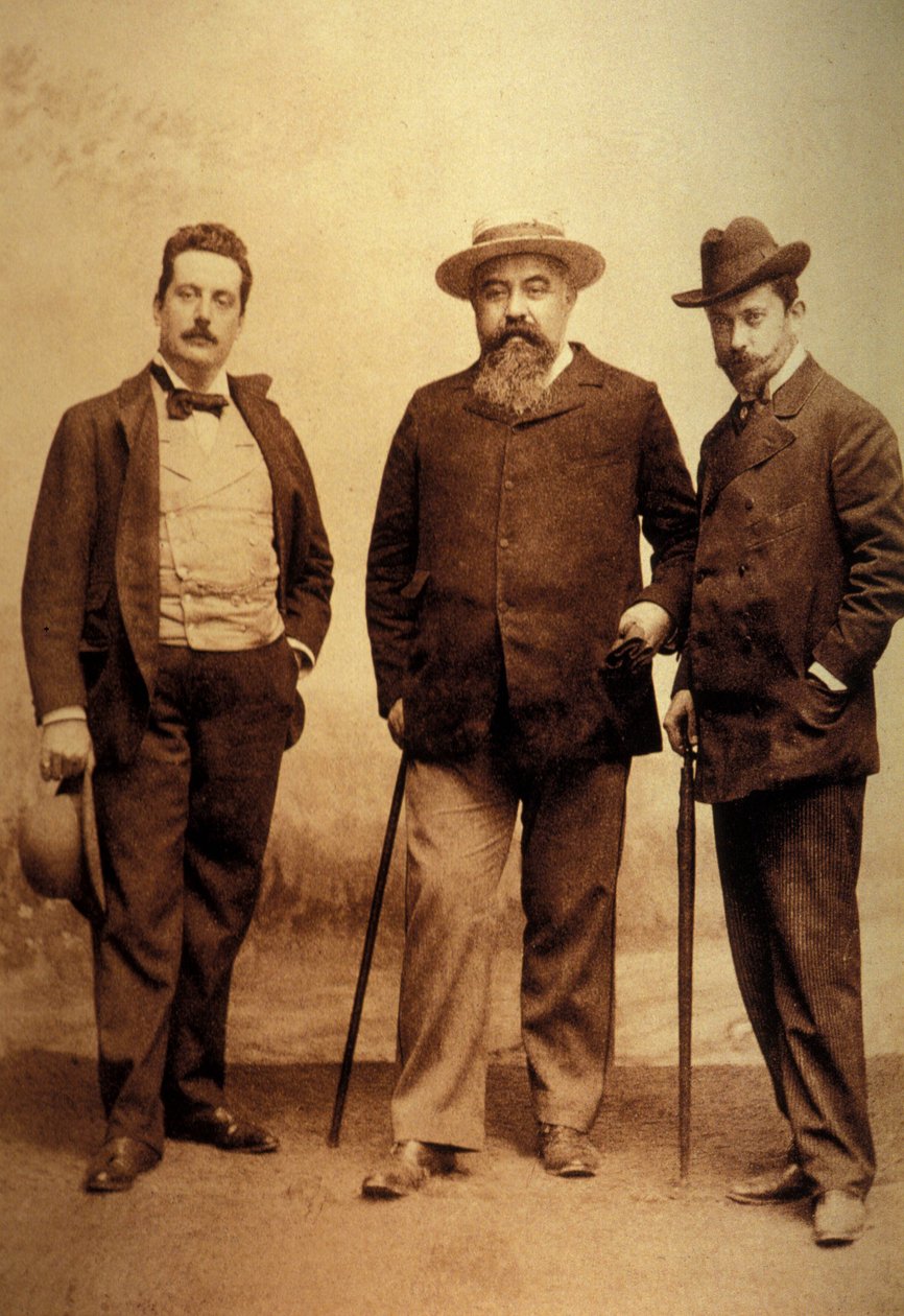 Giacomo Puccini (1858-1924), libretto yazarları Giuseppe Giacosa ve Luigi Ilica ile birlikte. by Unknown
