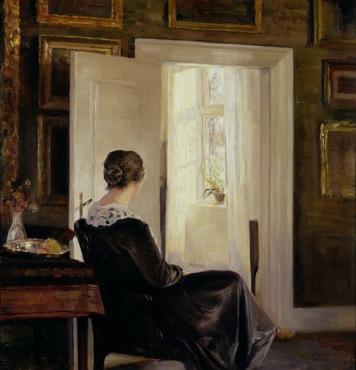 Bir kapının yanında oturan bir kadın by Carl Holsoe