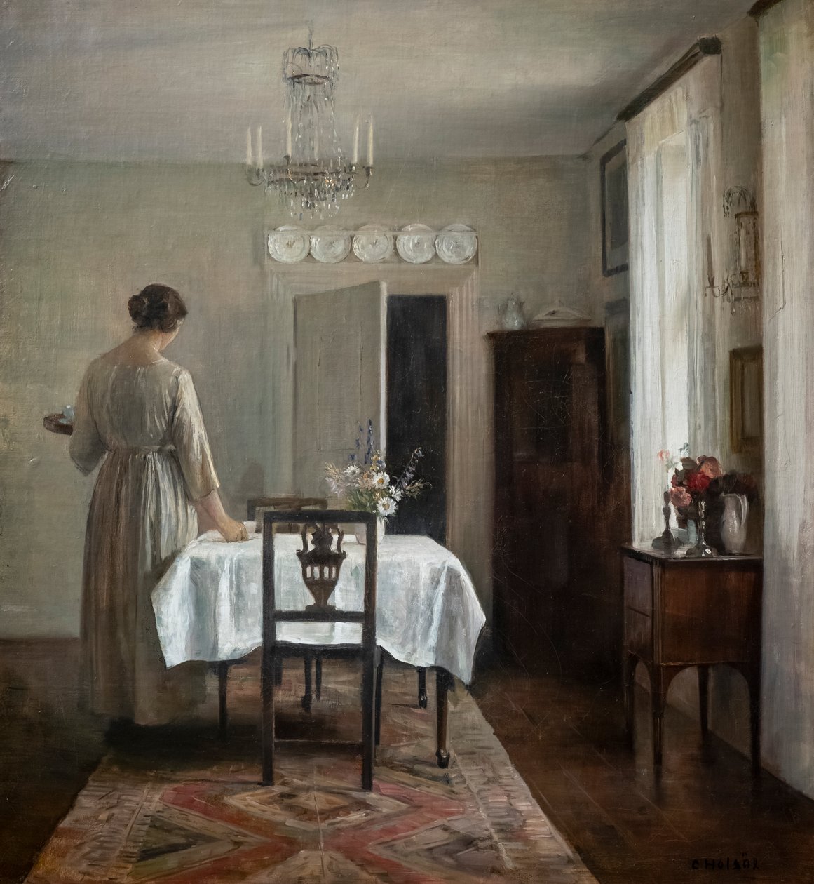 Sanatçının karısı sofrayı kuruyor by Carl Holsoe