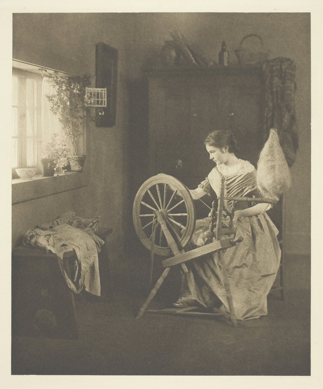 Eğirme, ç. 1898. by Emilie V. Clarkson