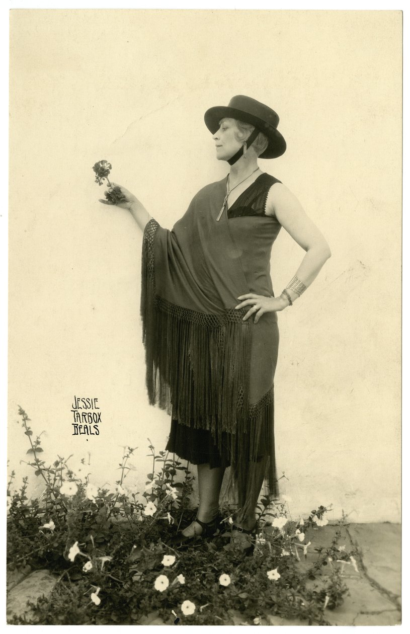 Bir çiçek tutan kadın, c.1905-40 by Jessie Tarbox Beals