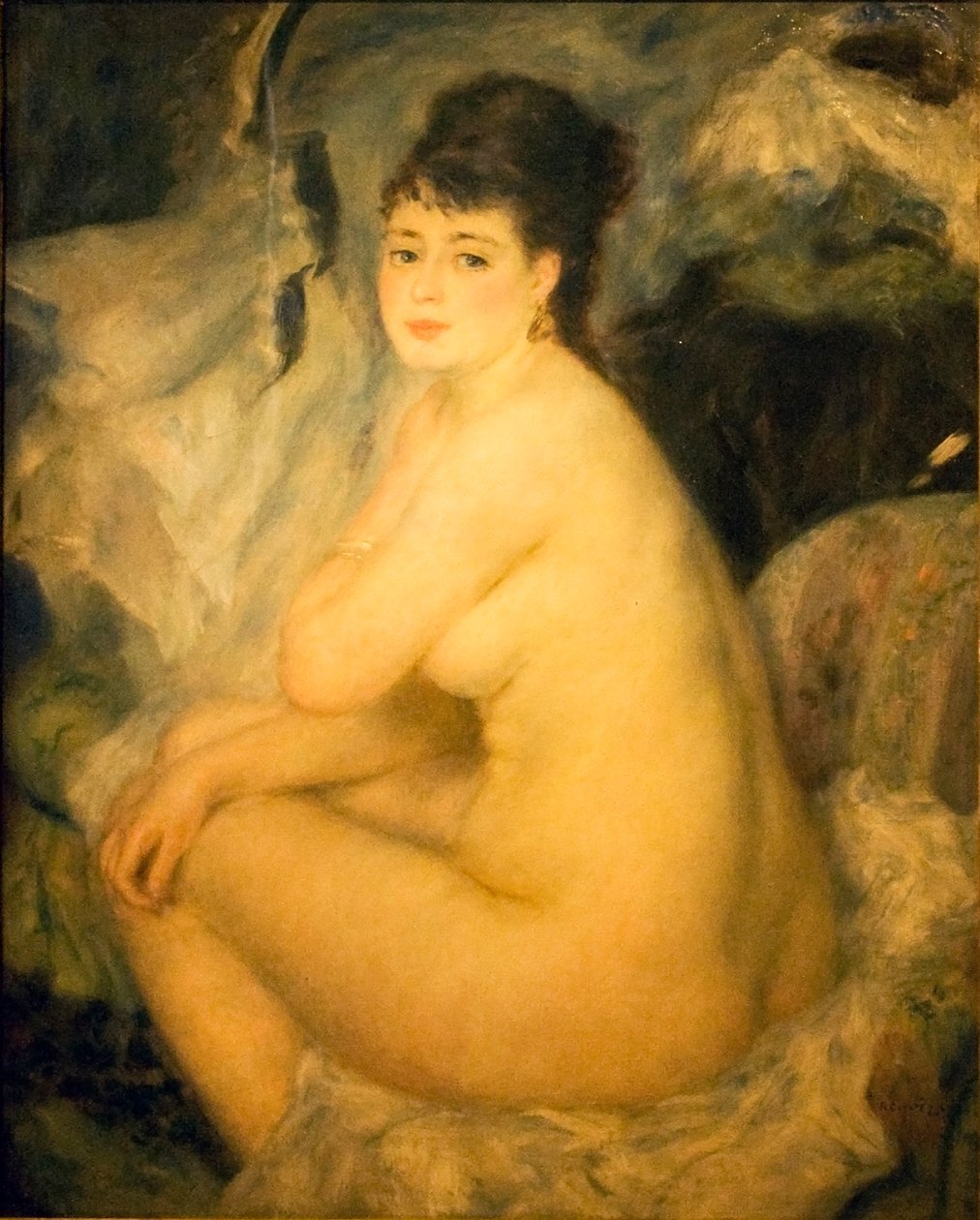 Kanepede oturan çıplak kadın Annan by Pierre Auguste Renoir