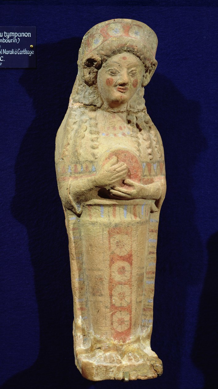 Statuette of a musician (polychrome stone) by Punic
