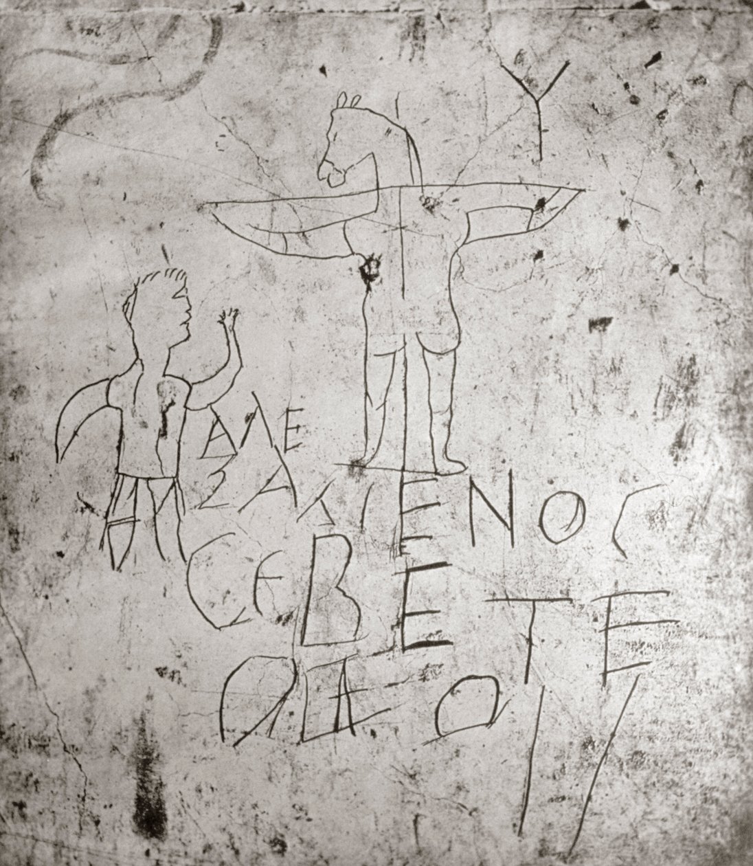 Çarmıha Gerilmenin Küfürlü graffitosu (taş) by Roman