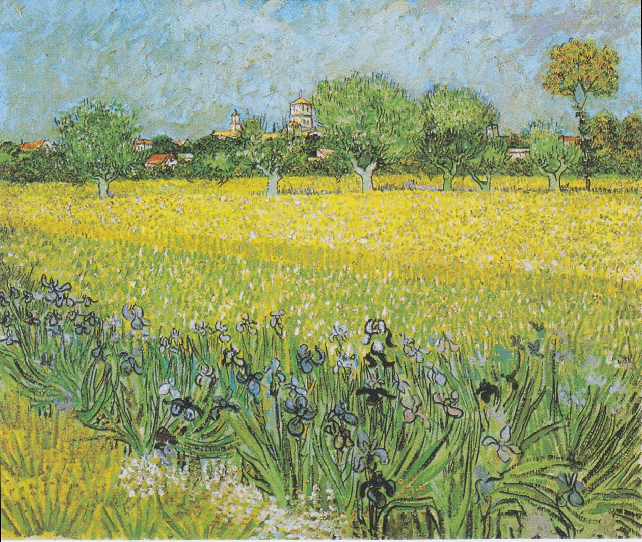 Ön planda Iris ile Arles görünümü by Vincent van Gogh