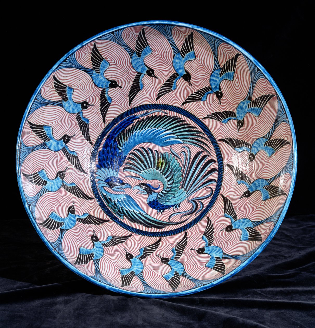 Deep punch bowl, with two eagles in the centre surrounded by swallows, painted by Fred Passenger (ceramic) (see also 267788) by William de Morgan